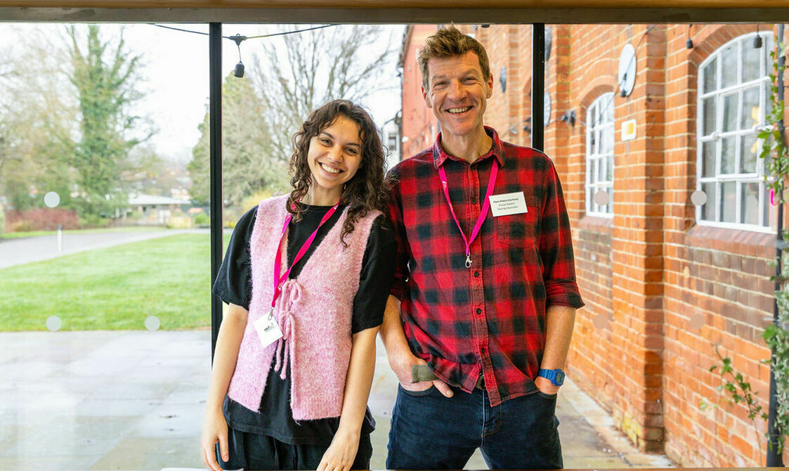Lils and Mark, house team in glass foyer space at Farnham Maltings