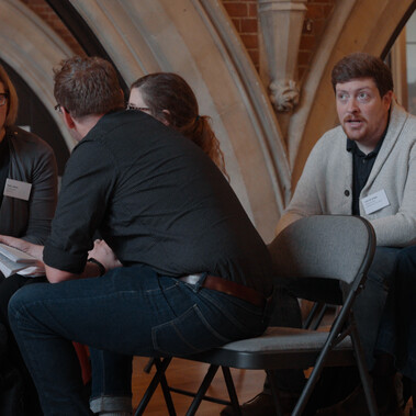 People sat down in conversation